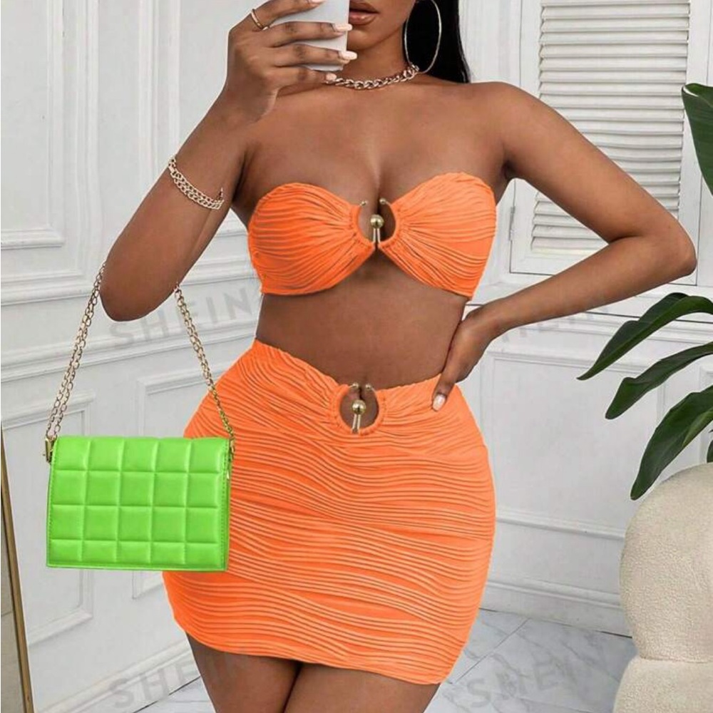 Orange two piece crop top and skirt set